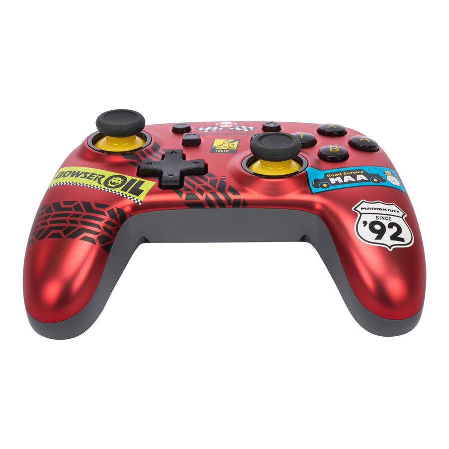 Rood Powera NSGP0124-01 bedrade gamepad met USB-kabel en stickers.